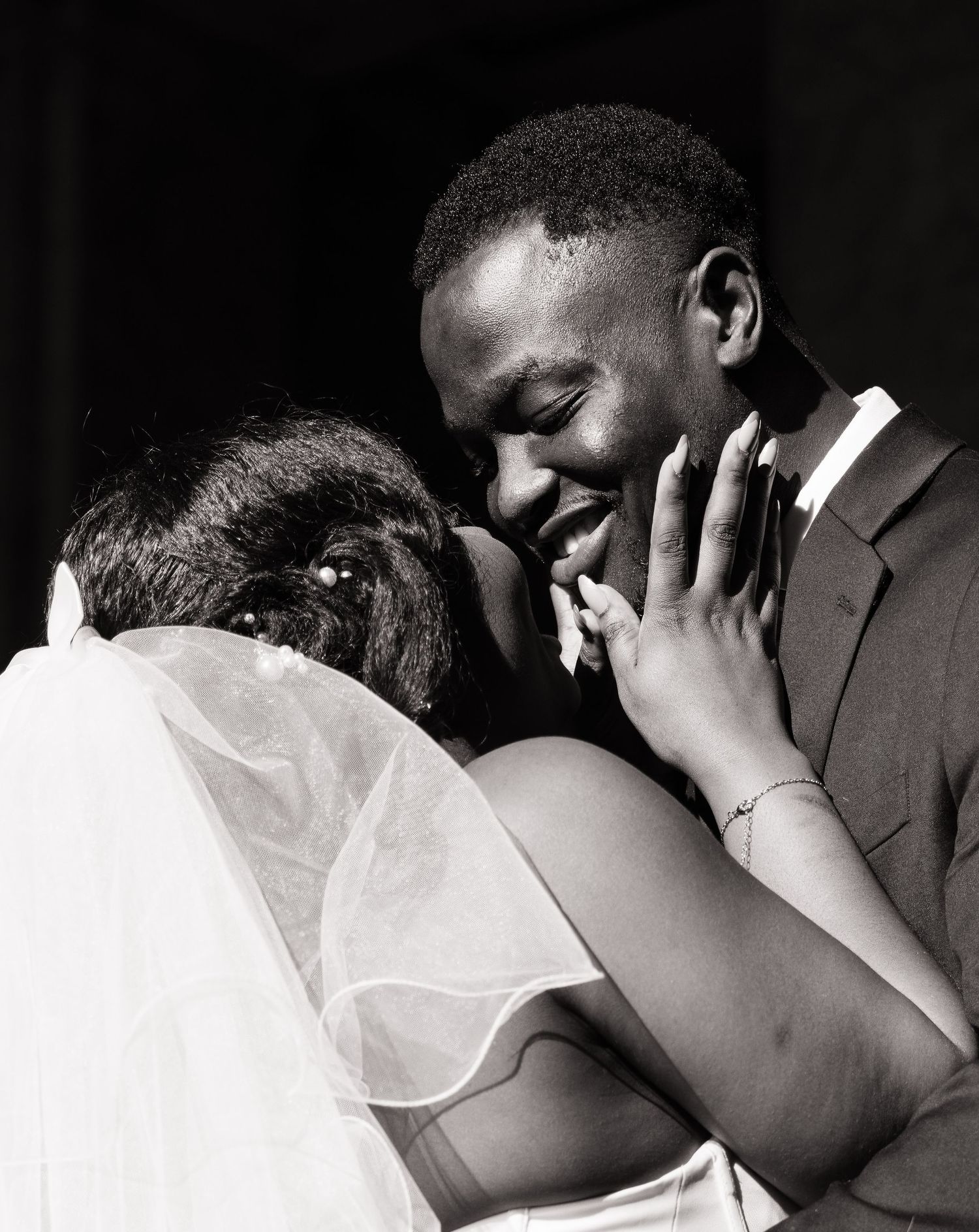 Intimate black and white portrait of a bride and groom during their Olympia wedding