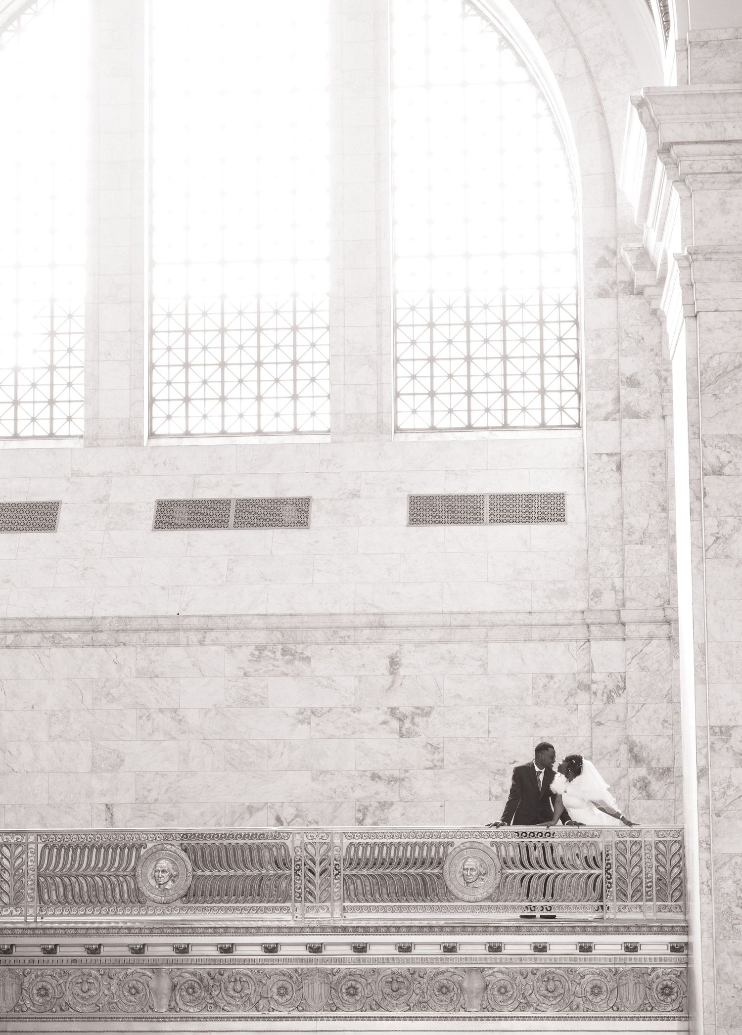 Wide black and white wedding portrait inside the Washington State Capitol in Olympia