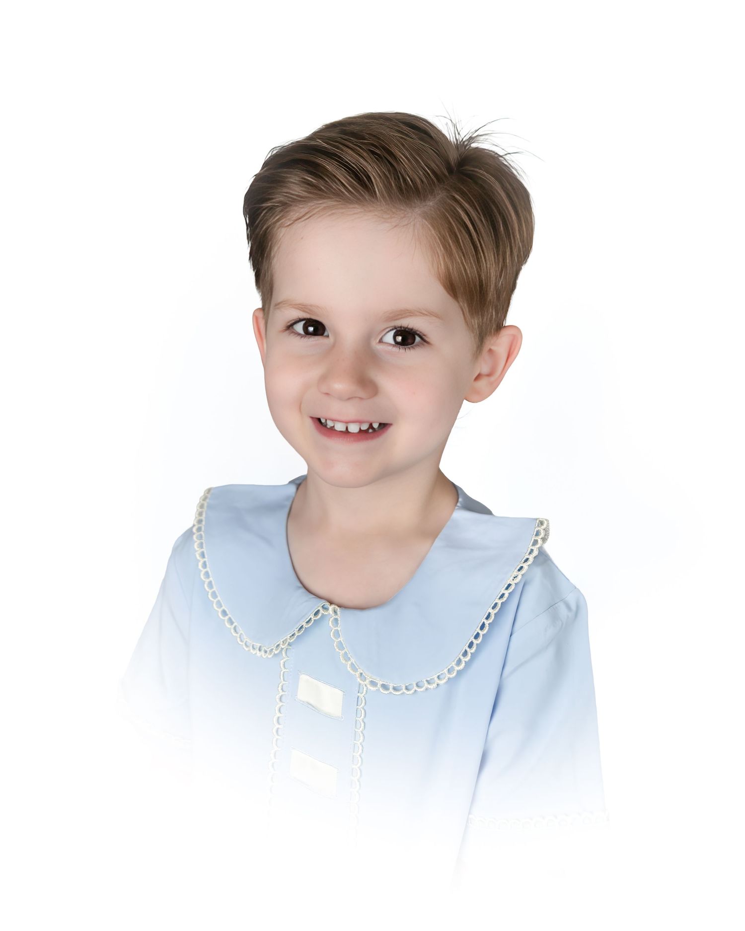 Smiling young boy with brown hair wearing a light blue peter pan collar shirt with trim detail.