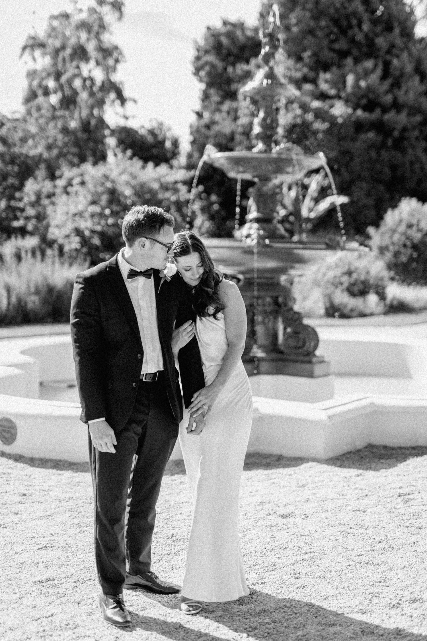 Brooke and Lloyd together near a fountain at Adelaide Botanic Garden.