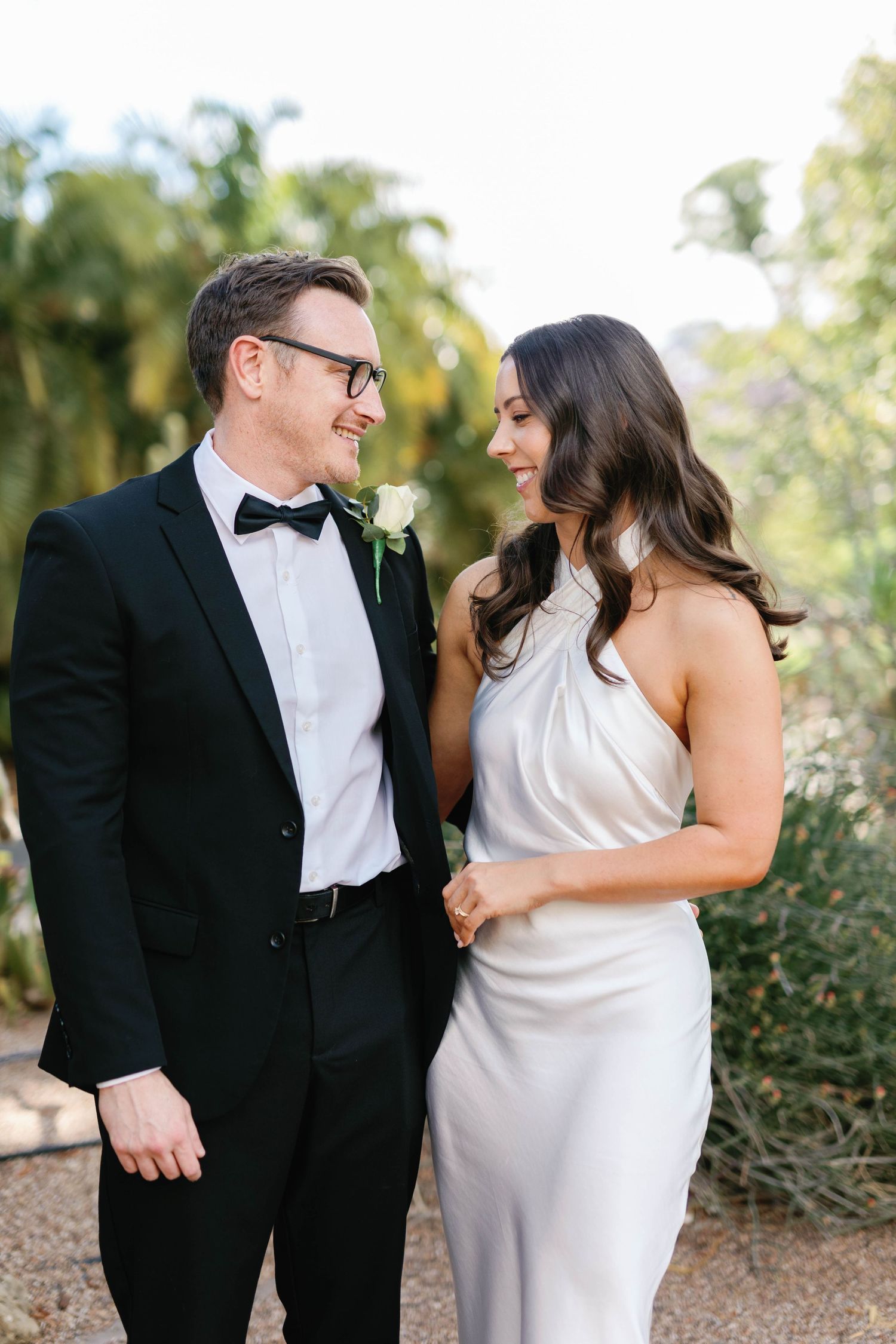 Brooke and Lloyd smiling at each other in Adelaide Botanic Garden