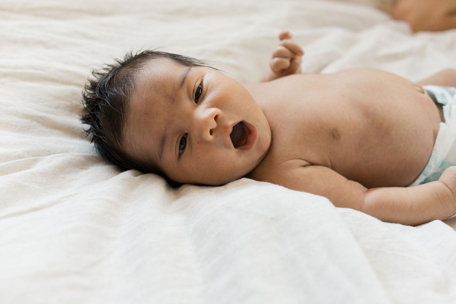 Newborn baby during an in-home lifestyle newborn photography session