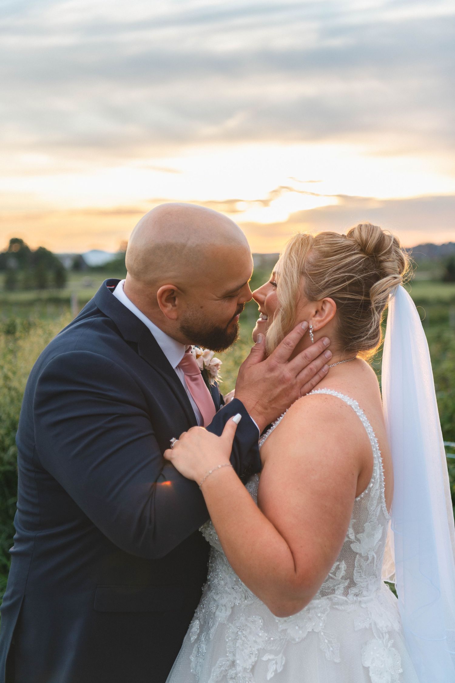 Bride and groom share a quiet moment at sunset at The Barn Event Space in Uxbridge, Ontario.