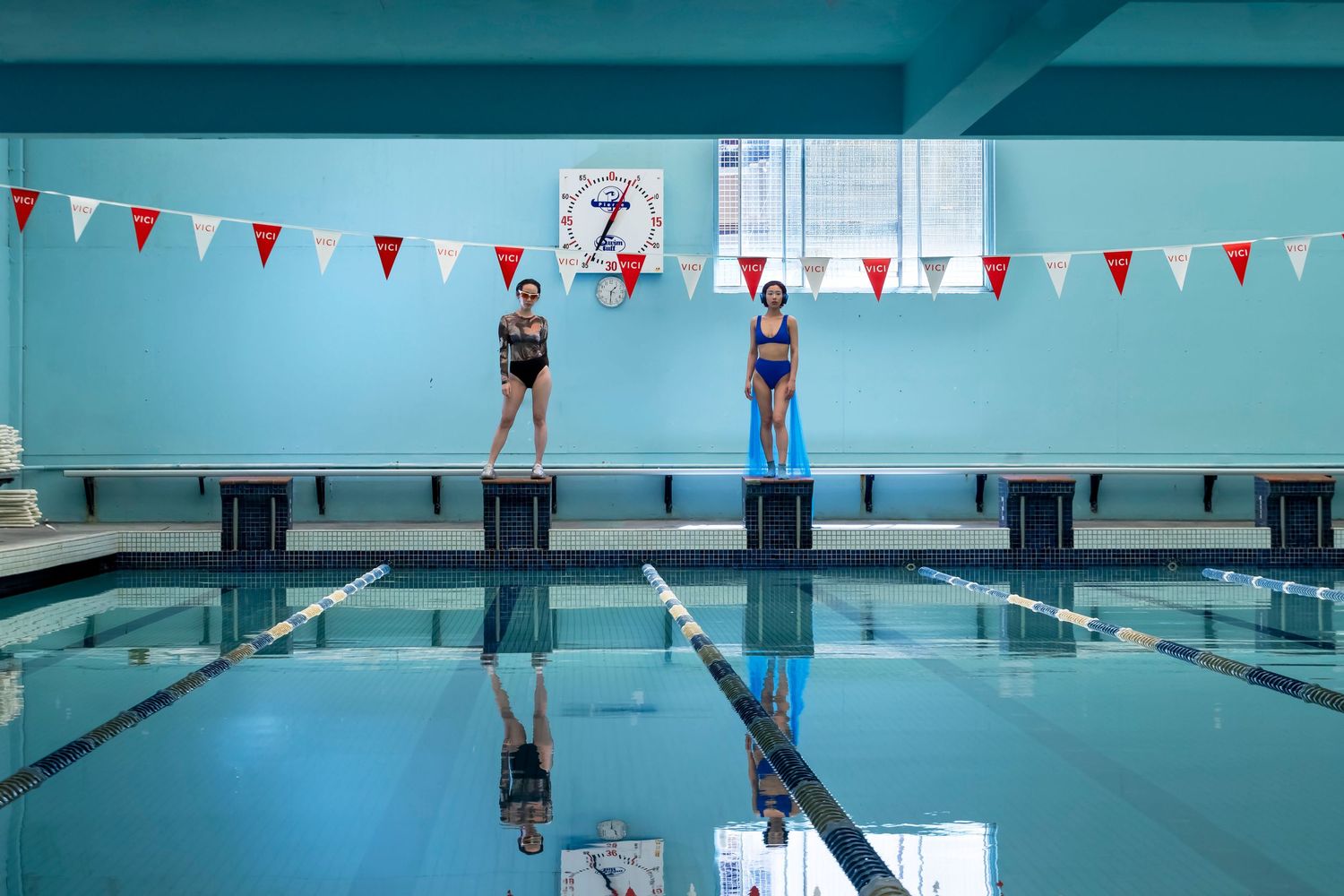 Editorial fashion photography in Sydney, exploring colour, symmetry and conceptual composition with designer styling.