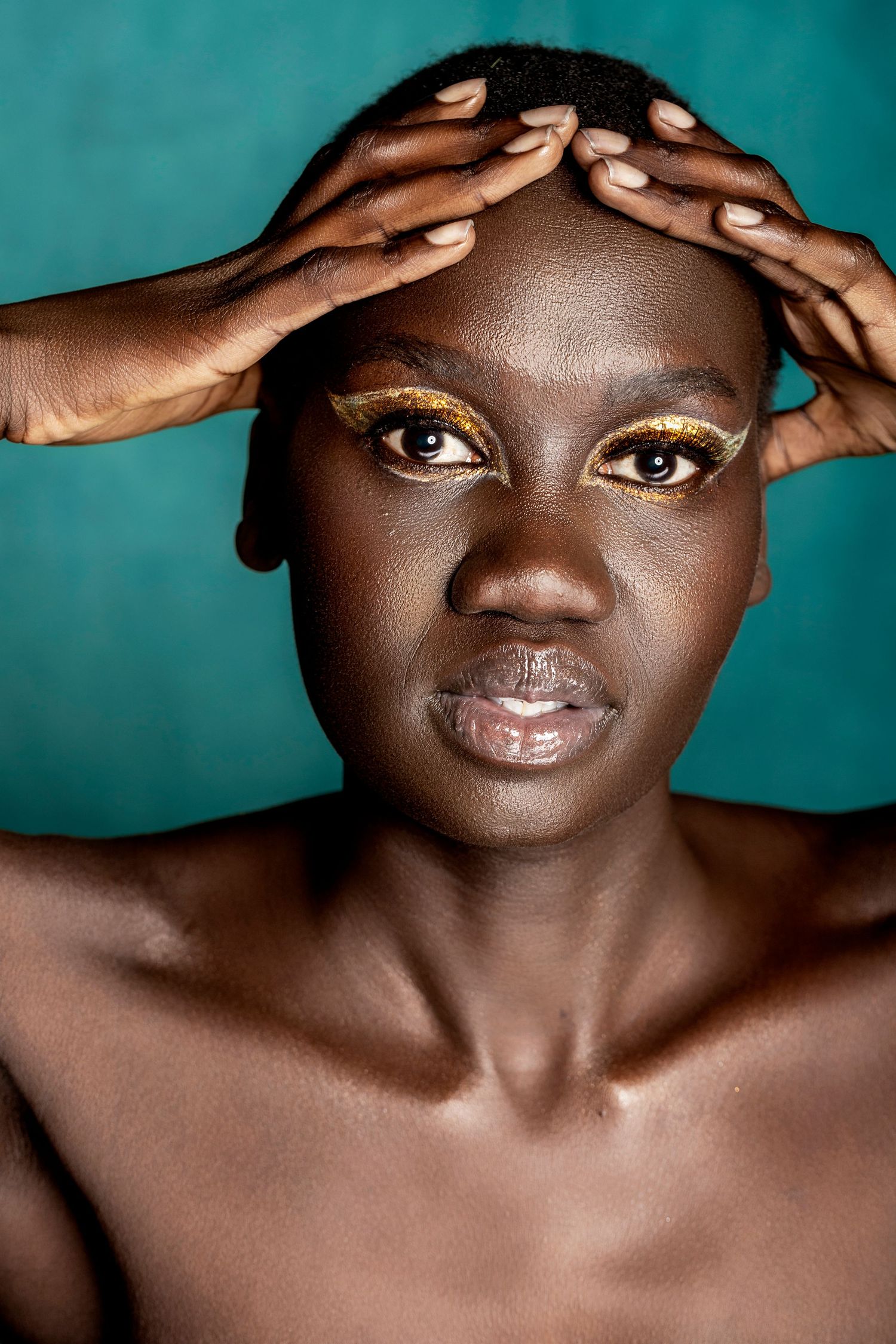 Beauty photography in Sydney highlighting skin texture, makeup detail and sculpted studio lighting.