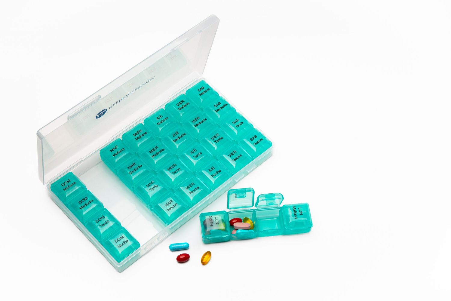 Product photo of a teal colored weekly pill organizer