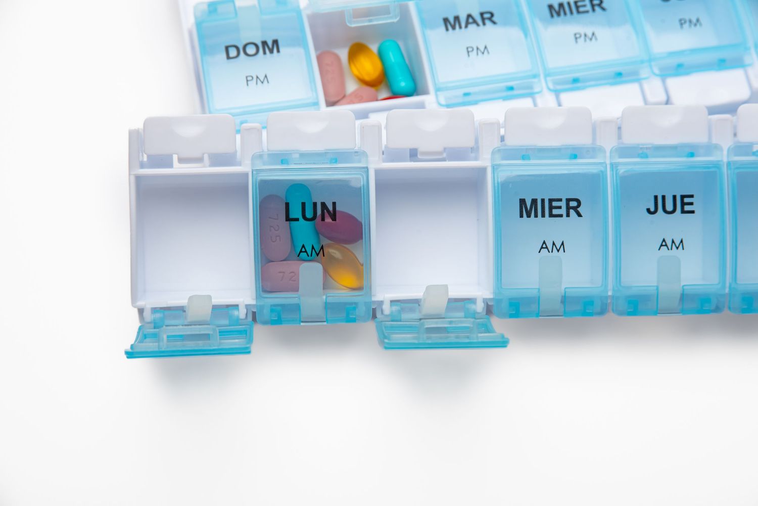 Weekly pill organizer with a tray removed.