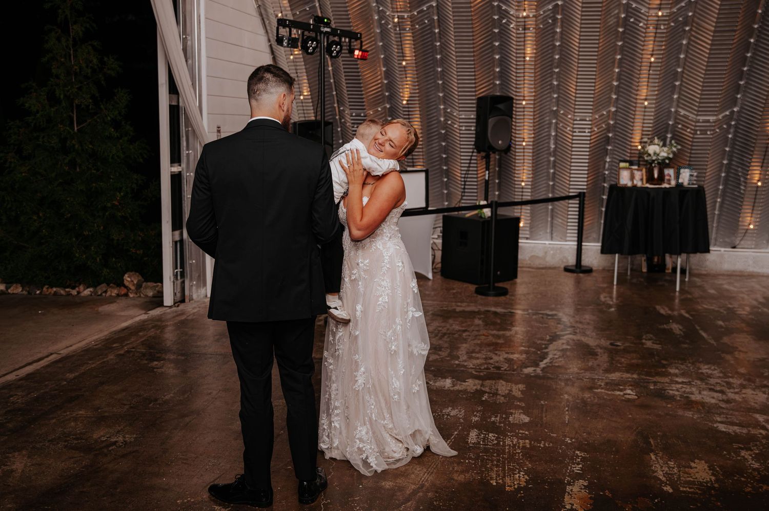 candid photograph of a bride and groom during a reception at Res-Les Farms.