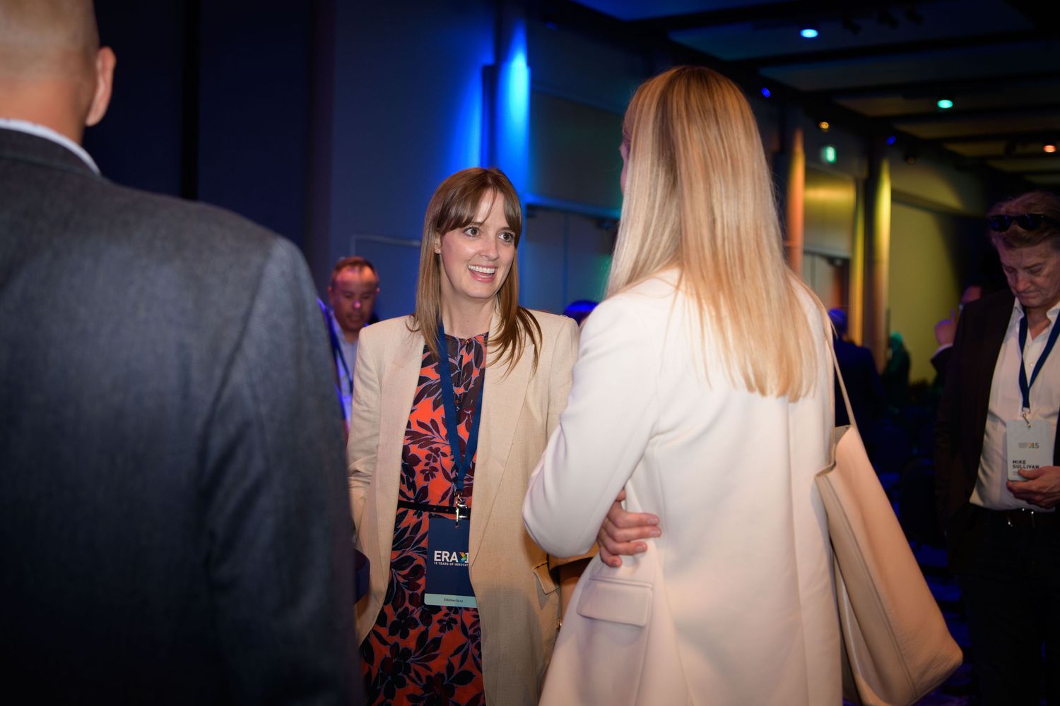 Close up shot of female event guest mingling at corporate event, Calgary event photographer