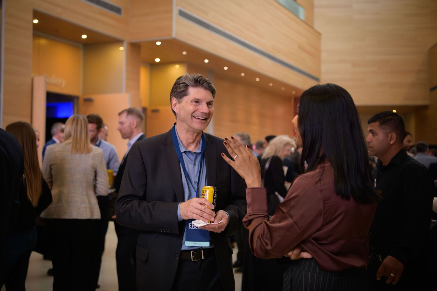 Event guests mingling at corporate event, Calgary event photographer