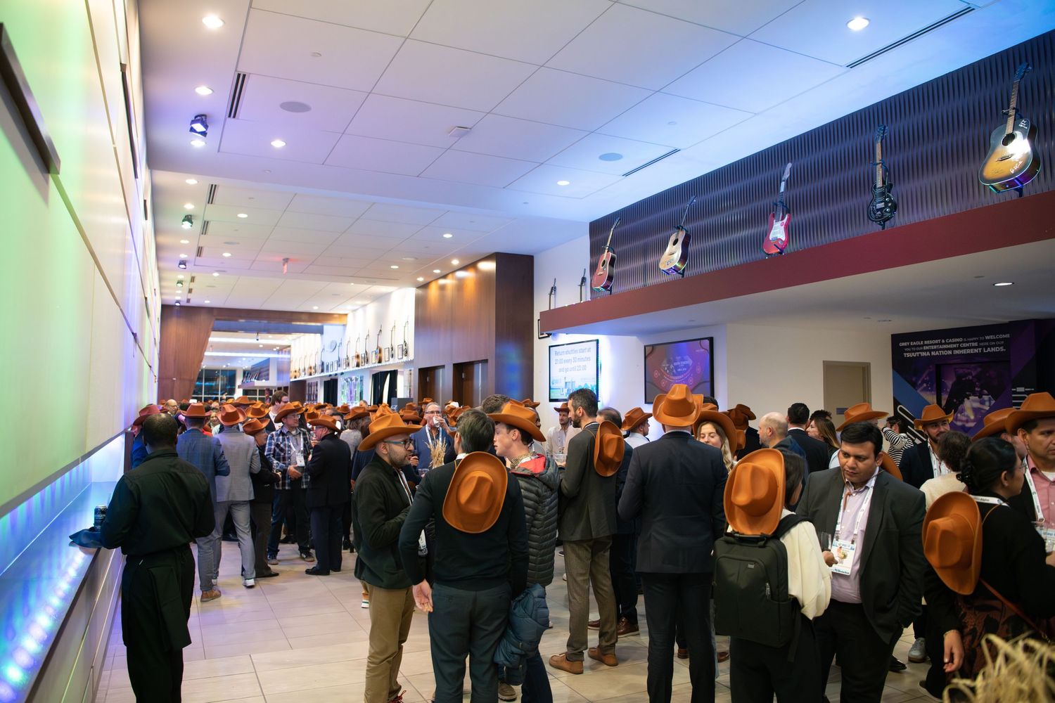 Guests networking at corporate cocktail reception, Calgary event photographer