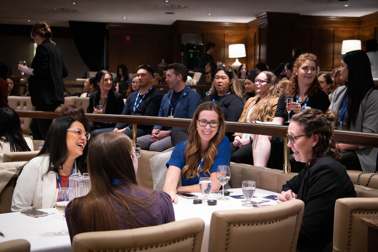 Shot of female event guests mingling at corporate event at the Calgary Petroleum Club, Calgary event photographer