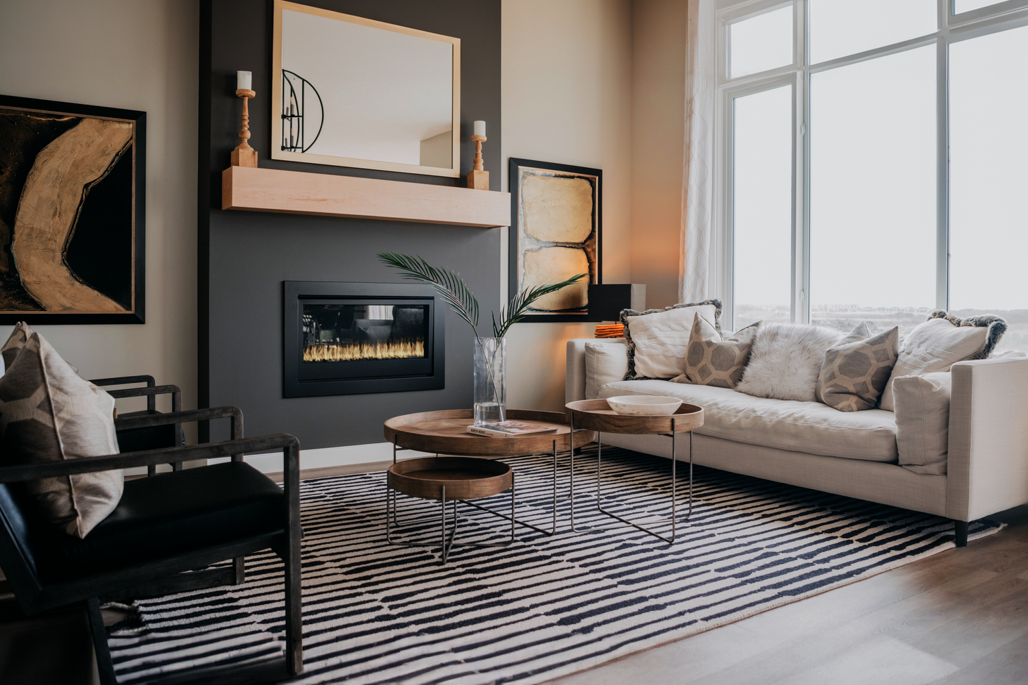 Open concept living room with hardwood floors and natural light, Calgary interior photographer