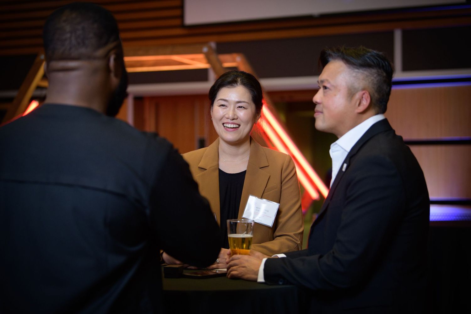 Party guests smiling at event, Calgary event photographer