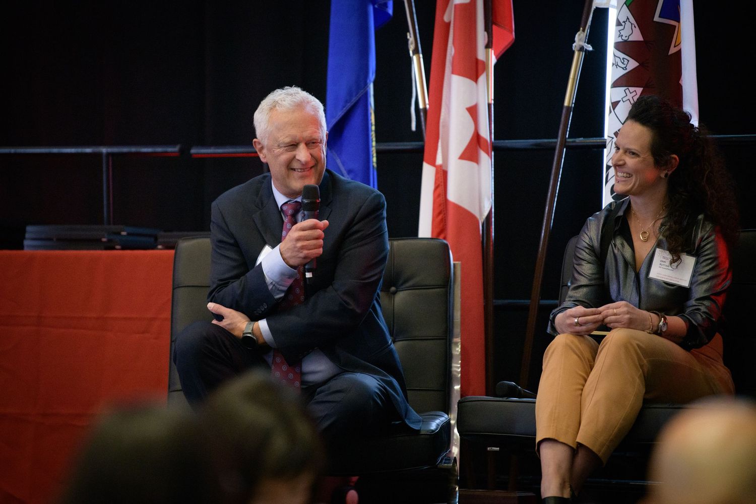 Keynote speaker presenting to audience, Calgary conference photographer