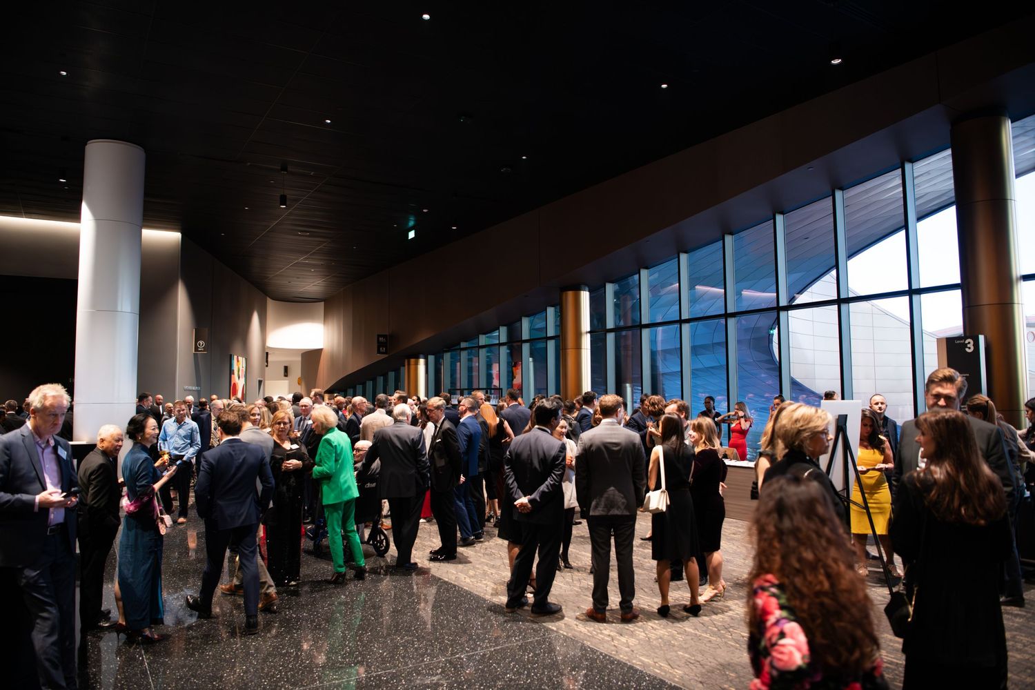 Guests networking at corporate cocktail reception, Calgary event photographer