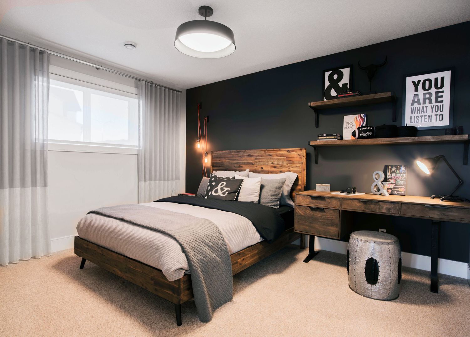 Master bedroom with neutral tones and layered bedding, Calgary interior photography