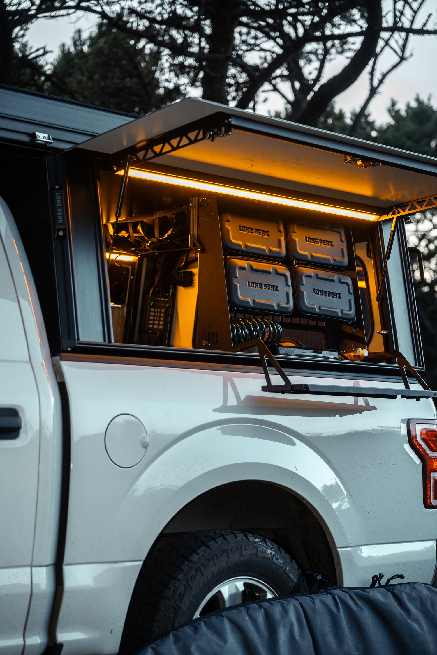 Lone peak side compartment with gear box after a surf session.