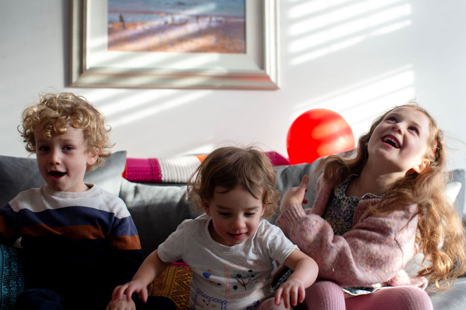 3 kids having fun during a photo session. Lifestyle family and childhood photoshoot by The Mother's Eye, Beckenham, South East London.