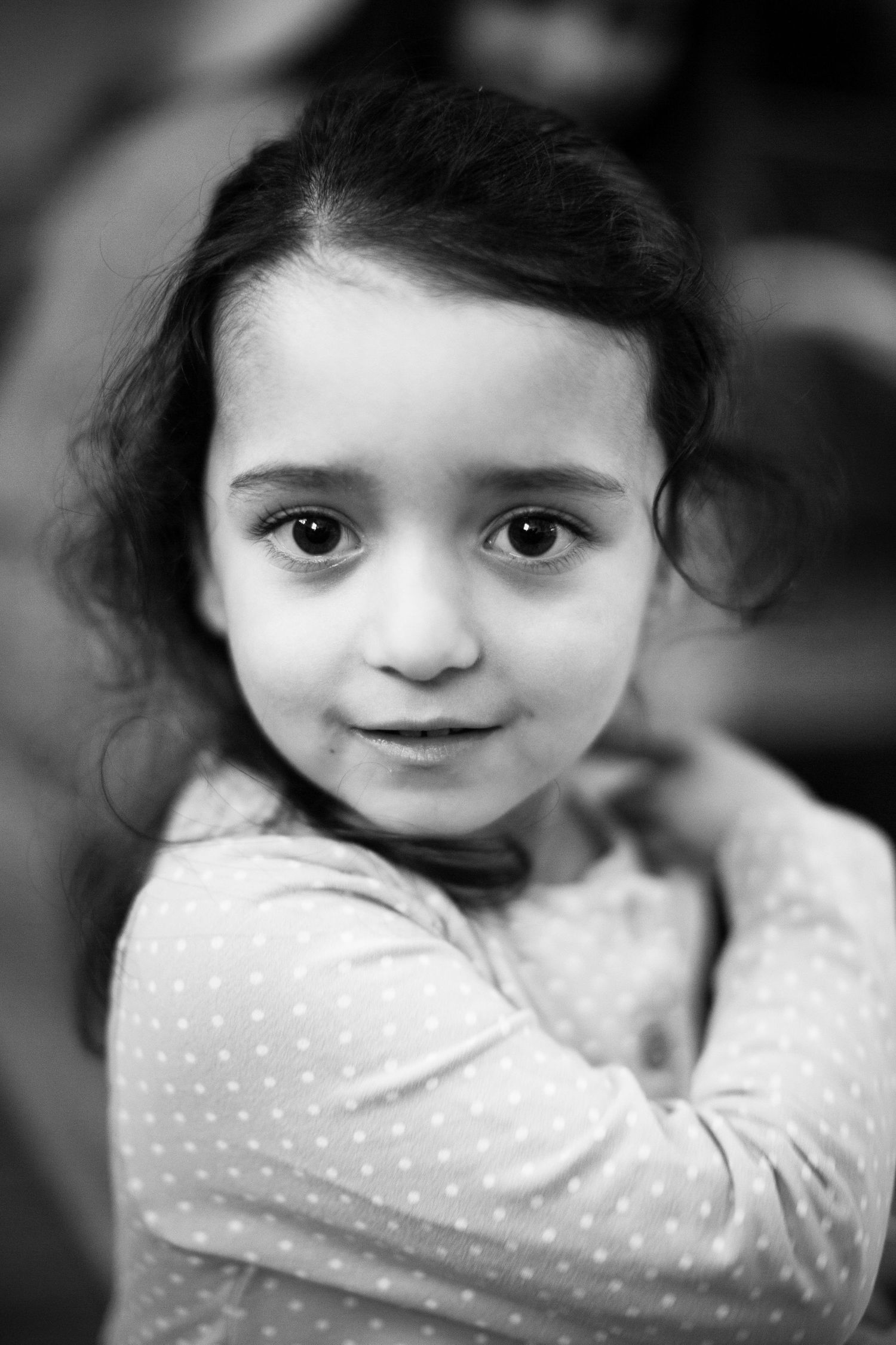 A black and white portrait of a toddler. The Mother's Eye - fun documentary-stele childhood photography in Deptfort, South East London.