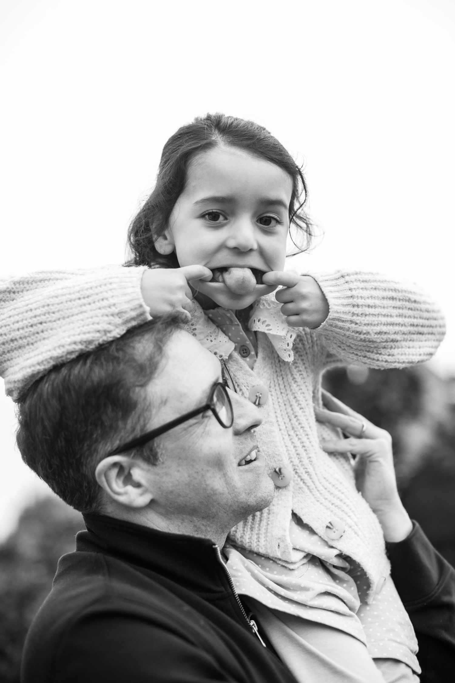 Father and daughter having fun. The Mother's Eye - candid documentary-stele childhood photography in Crystal Palace, South East London.