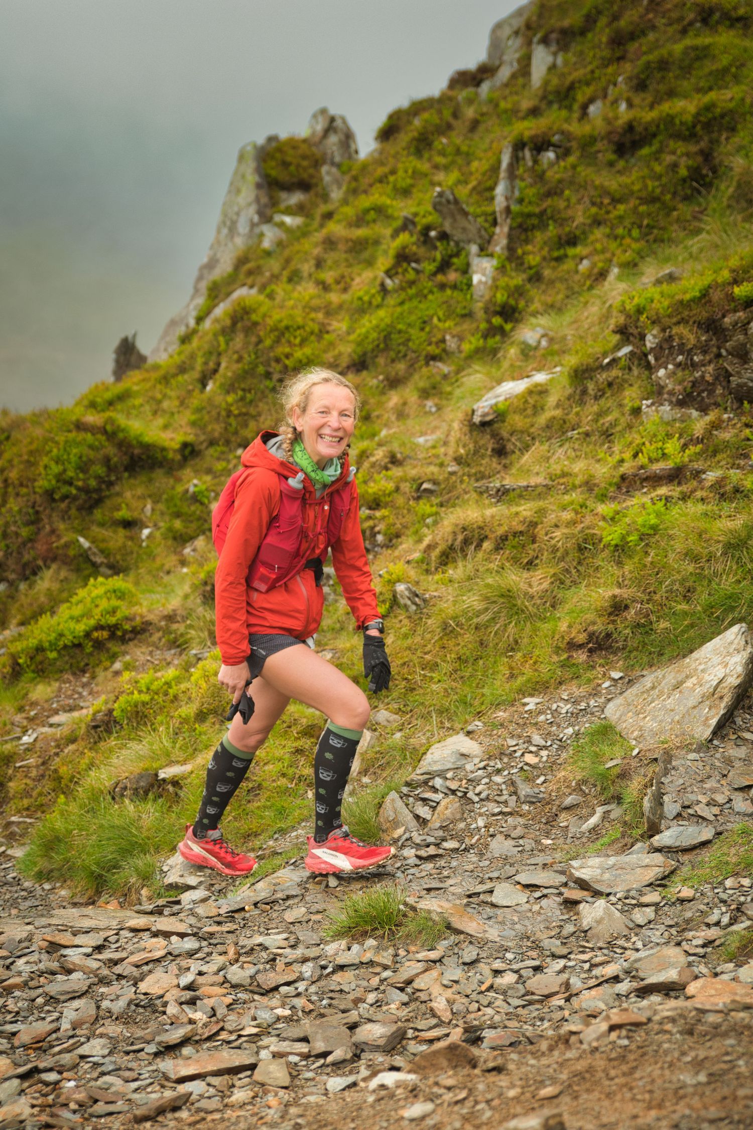 Competitor during the Welsh 1000 m race enjoying the steep mountains of Ogwen and the heavy rain and wind of the Snowdonia National Park