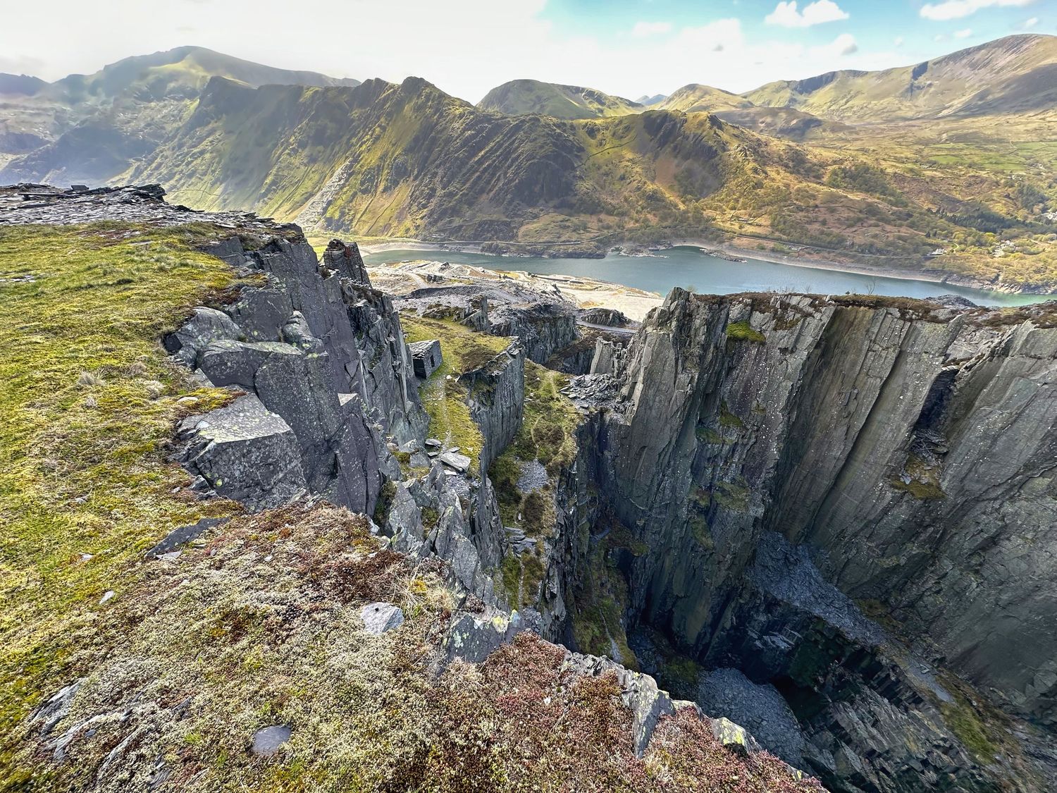Snowdonia National Park in North Wales featuring rugged mountains, dramatic valleys, and old mining industries that feature goats