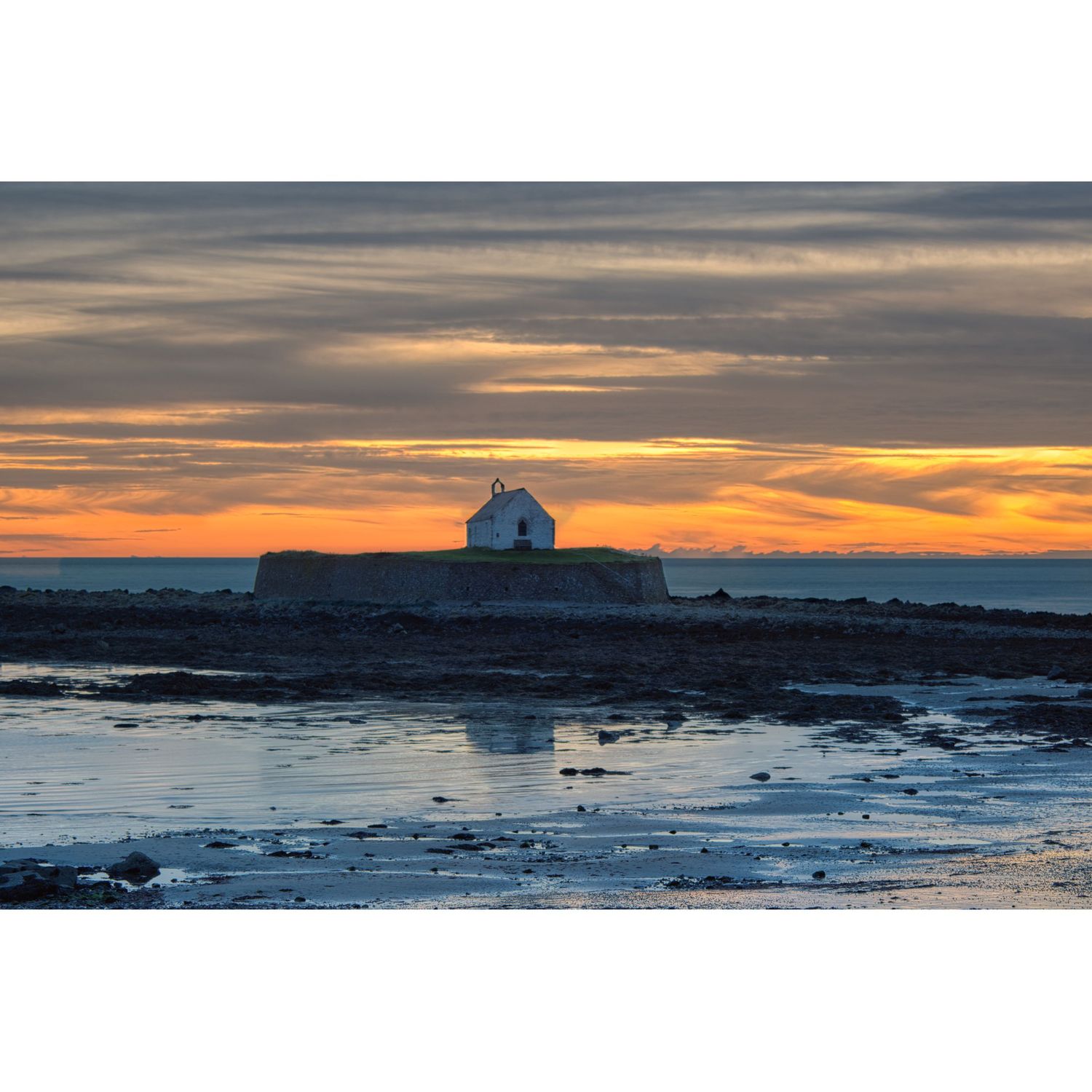 St Cwyfan’s Church, Anglesey’s famous Church in the Sea — an ancient, atmospheric gem steeped in history and surrounded by tides.
