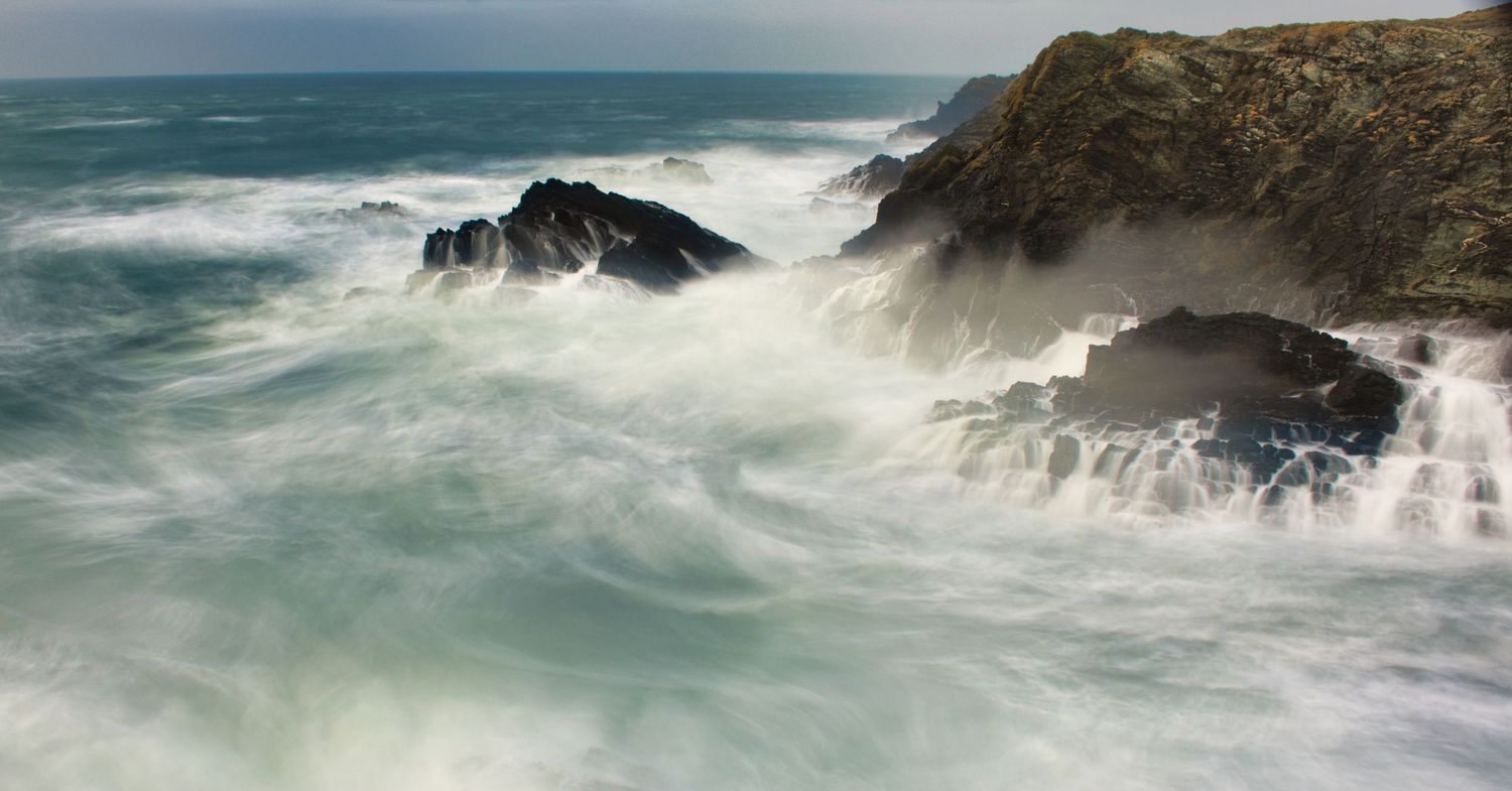 Scenic Snowdonia National Park in North Wales with mountain peaks, rolling hills, and iconic Welsh coastline.