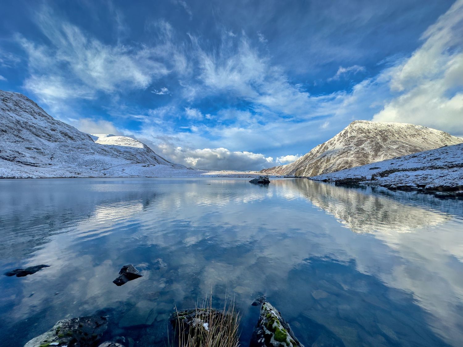 Snowdonia National Park in North Wales featuring rugged mountains, dramatic valleys, and old mining industries that feature goats
