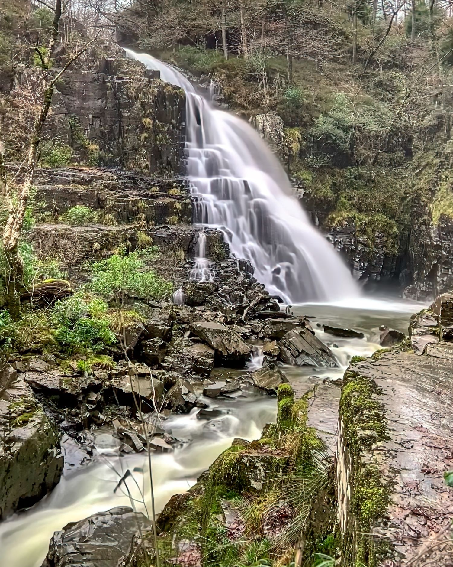Snowdonia National Park in North Wales featuring rugged mountains, dramatic valleys, and old mining industries built high up in the mountain