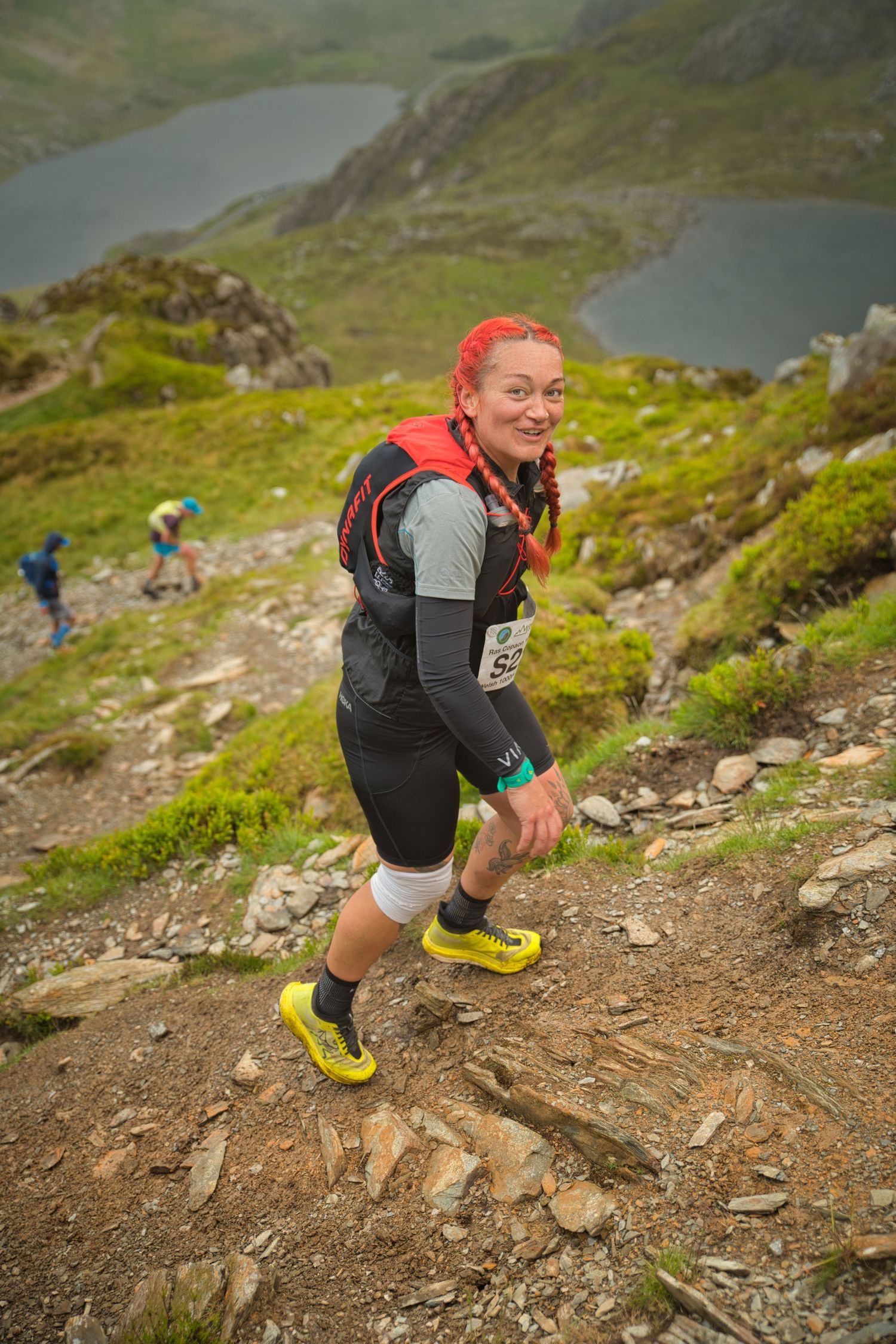 Competitor during the Welsh 1000 m race enjoying the steep mountains of Ogwen and the heavy rain and wind of the Snowdonia National Park