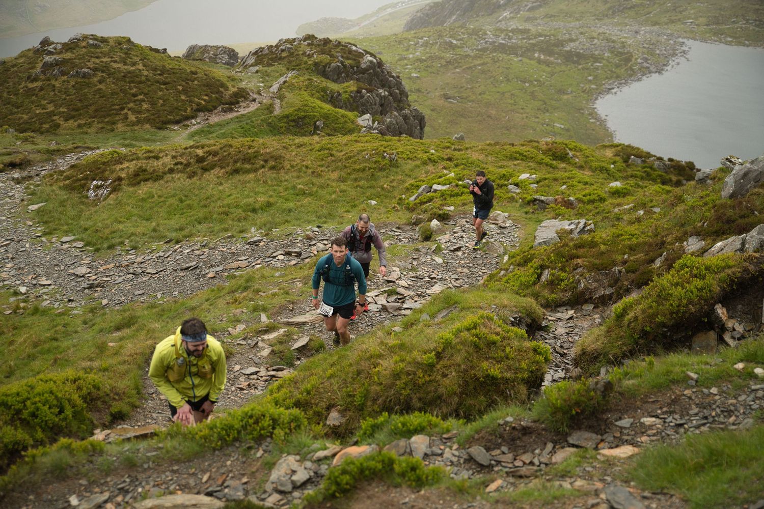 Competitor during the Welsh 1000 m race enjoying the steep mountains of Ogwen and the heavy rain and wind of the Snowdonia National Park