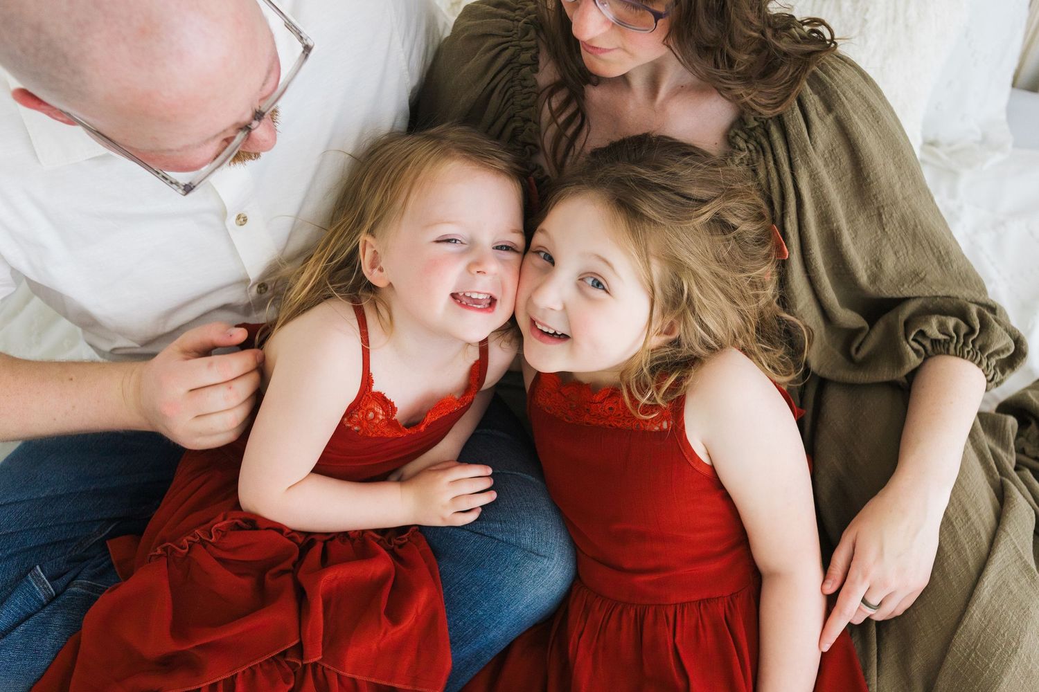 Springfield Missouri family portrait – parents and children together in clean natural-light studio by Fairchild Photo Co