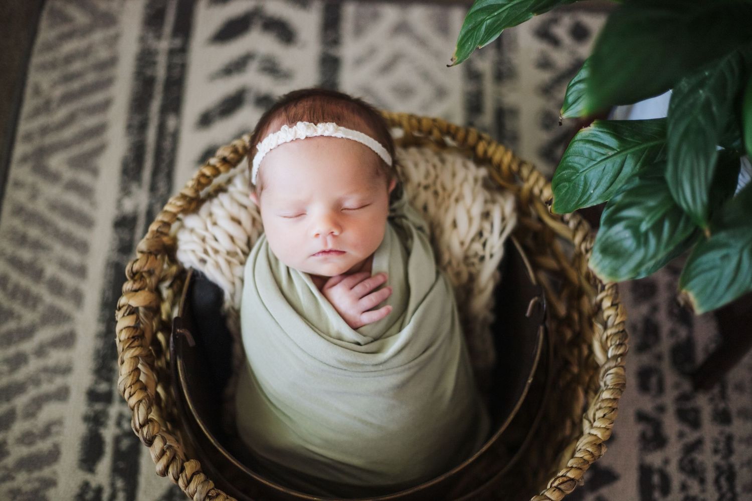 Wrapped newborn in cream tones during professional photo session – Fairchild Photo Co Springfield MO