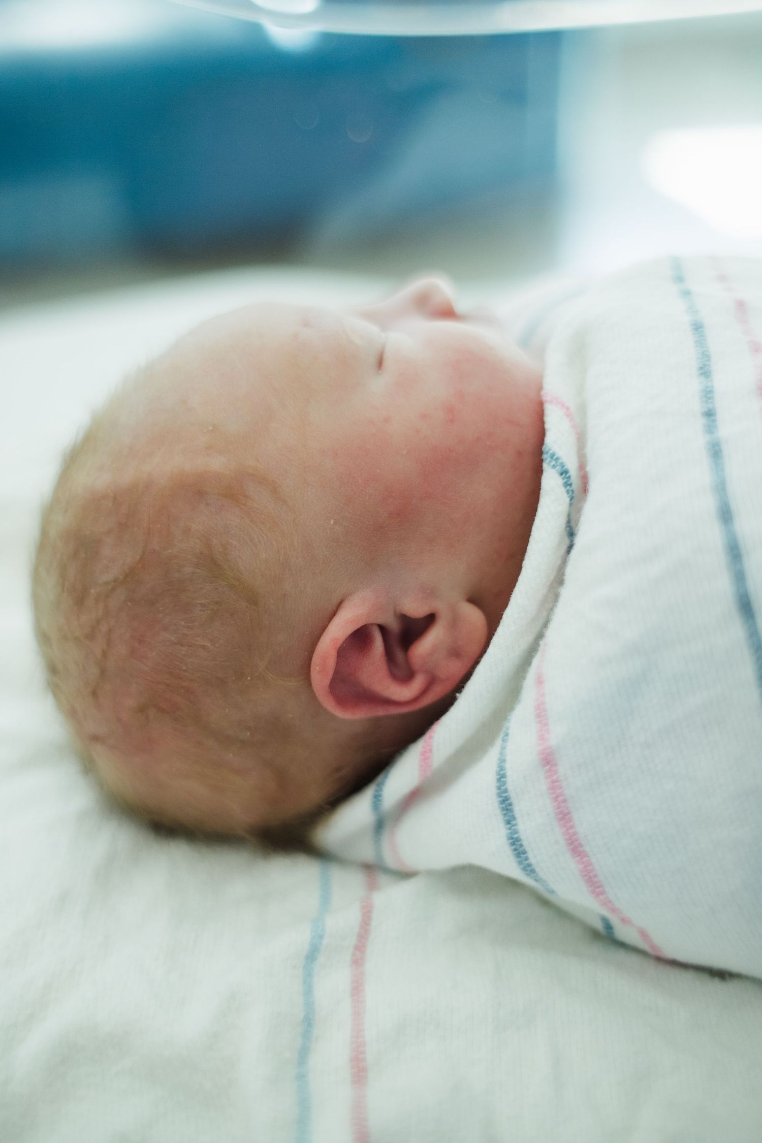 close up of newborn baby ear in hospital Fresh 48 session Springfield MO photographer