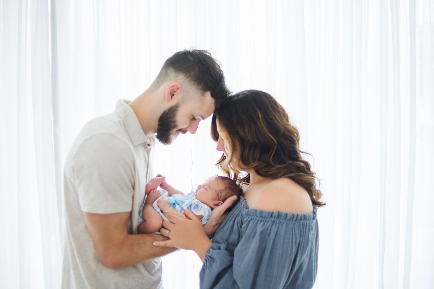 Springfield MO newborn photographer – peaceful sleeping baby wrapped in neutral tones at Share 417 studio
