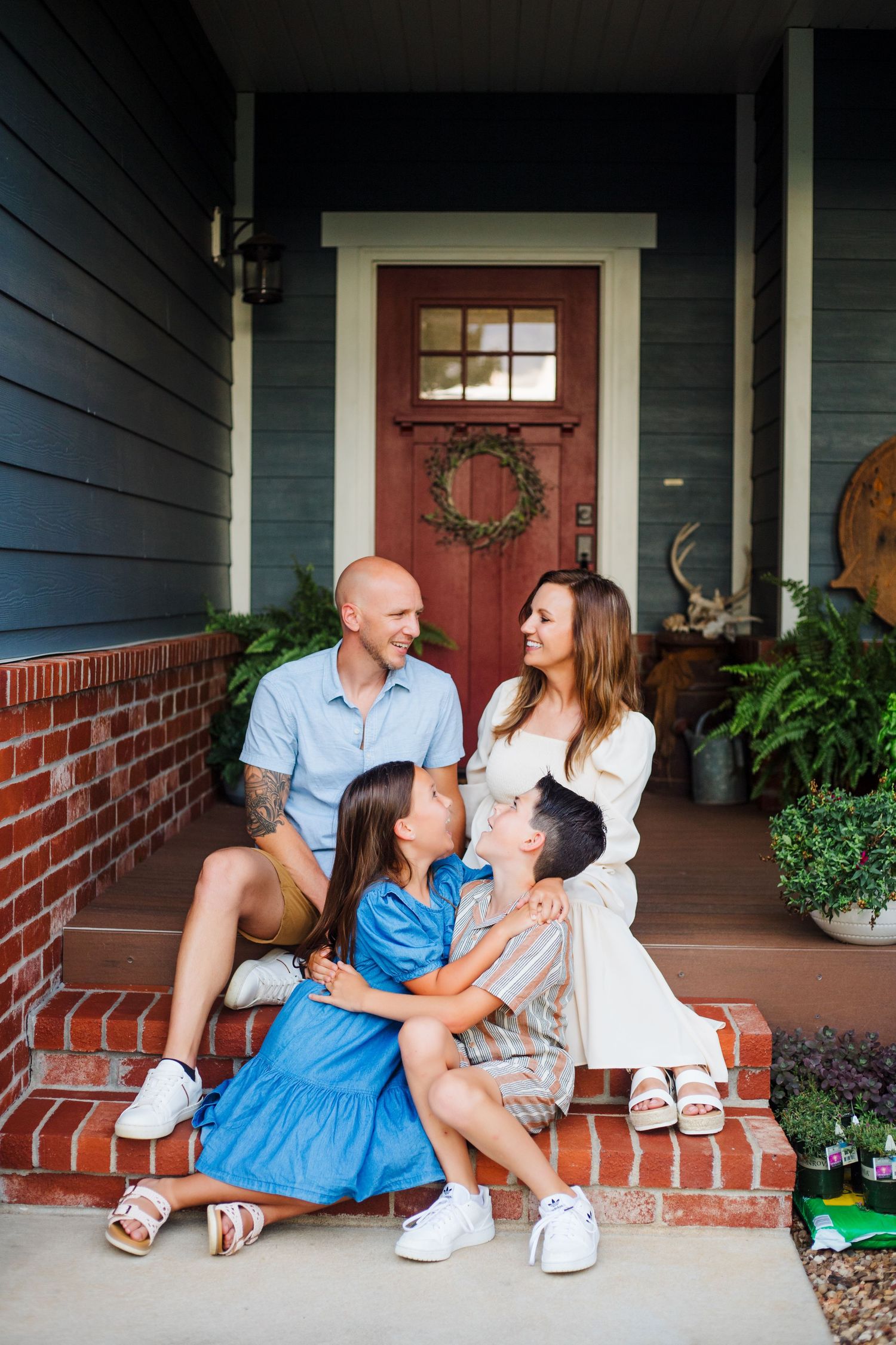 Springfield MO lifestyle family session – cozy in-home portraits with parents and two kids by Fairchild Photo Co
