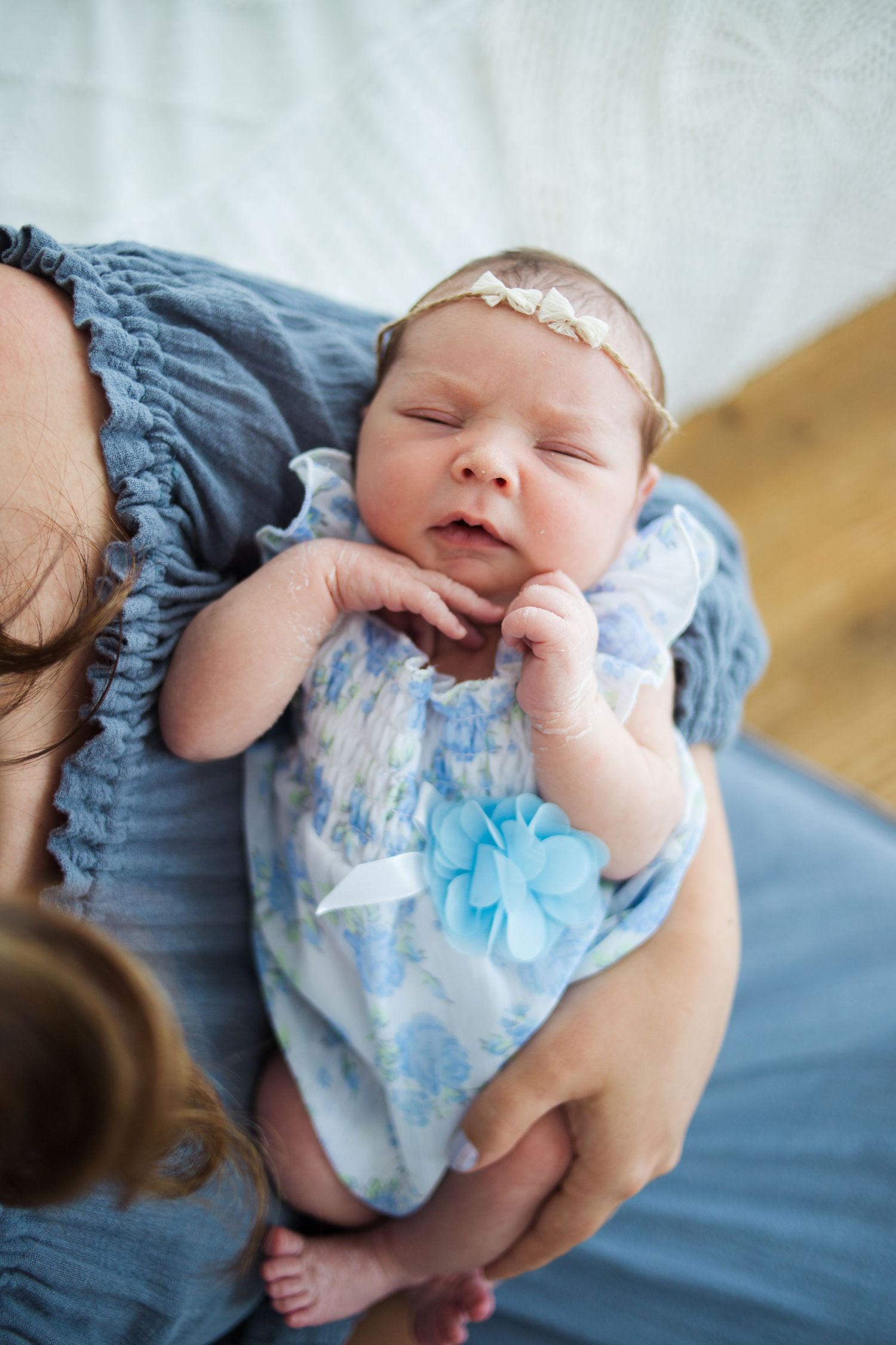 Baby girl in natural light setup at Studio Share 417 – posed newborn photo by Fairchild Photo Co