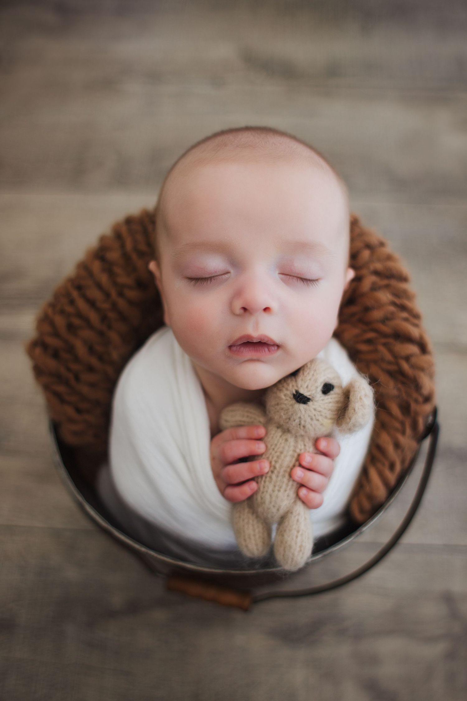 Newborn portrait session featuring soft neutral wraps – Fairchild Photo Co Springfield MO