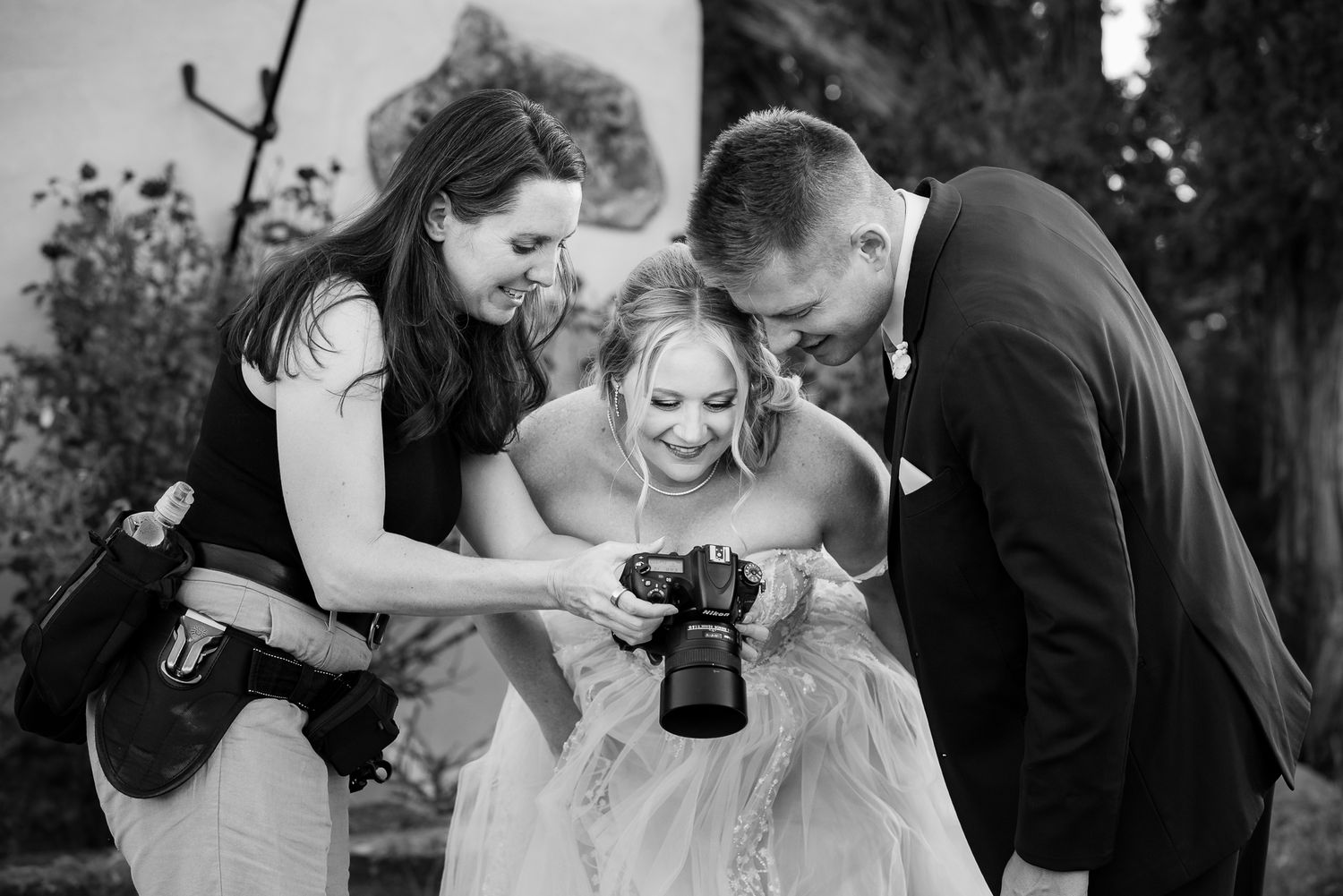 A collection of candid black and white wedding moments shows couples sharing intimate gestures during their special day.
