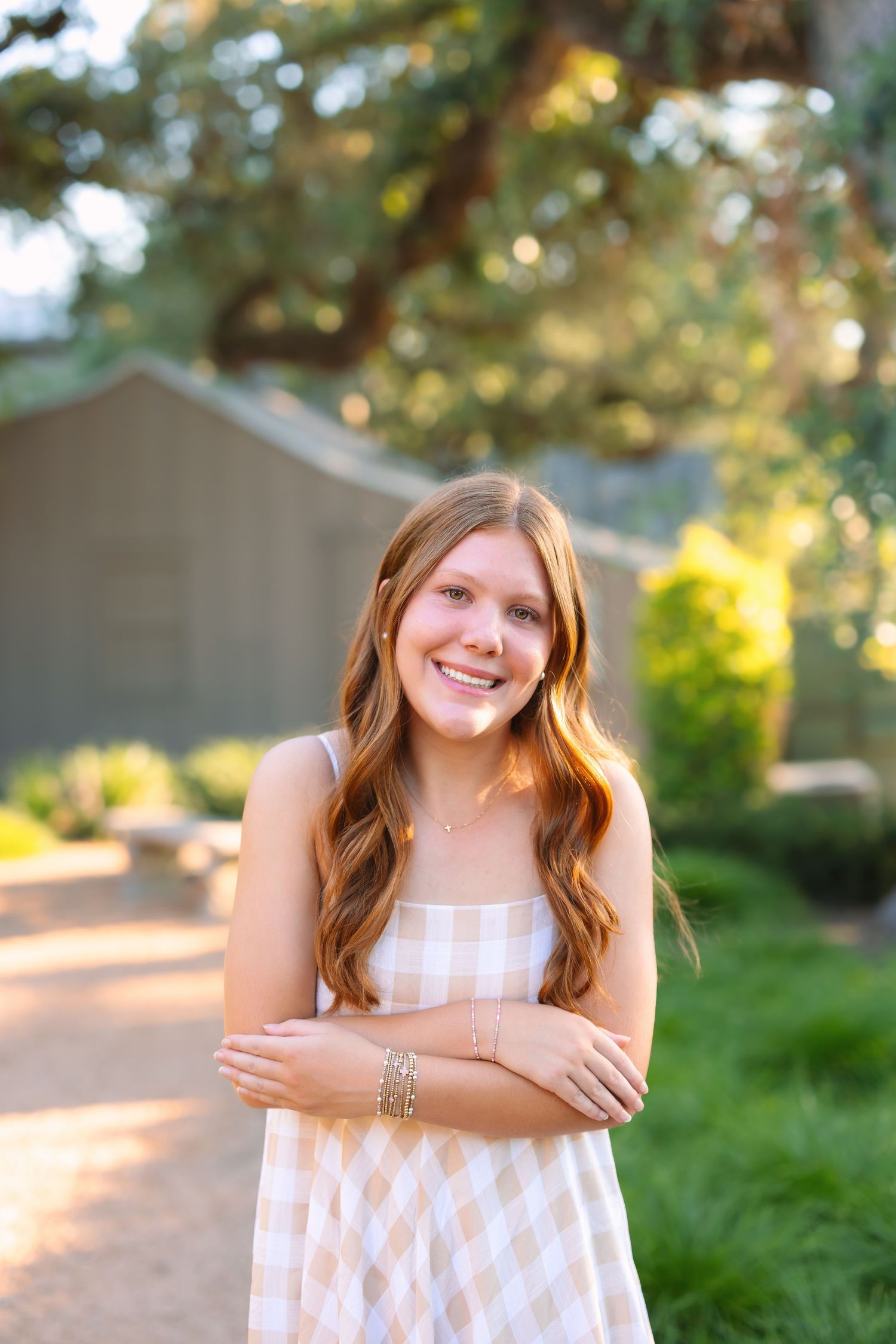 A series of outdoor portrait photos showing someone in a white summer dress against a natural background.