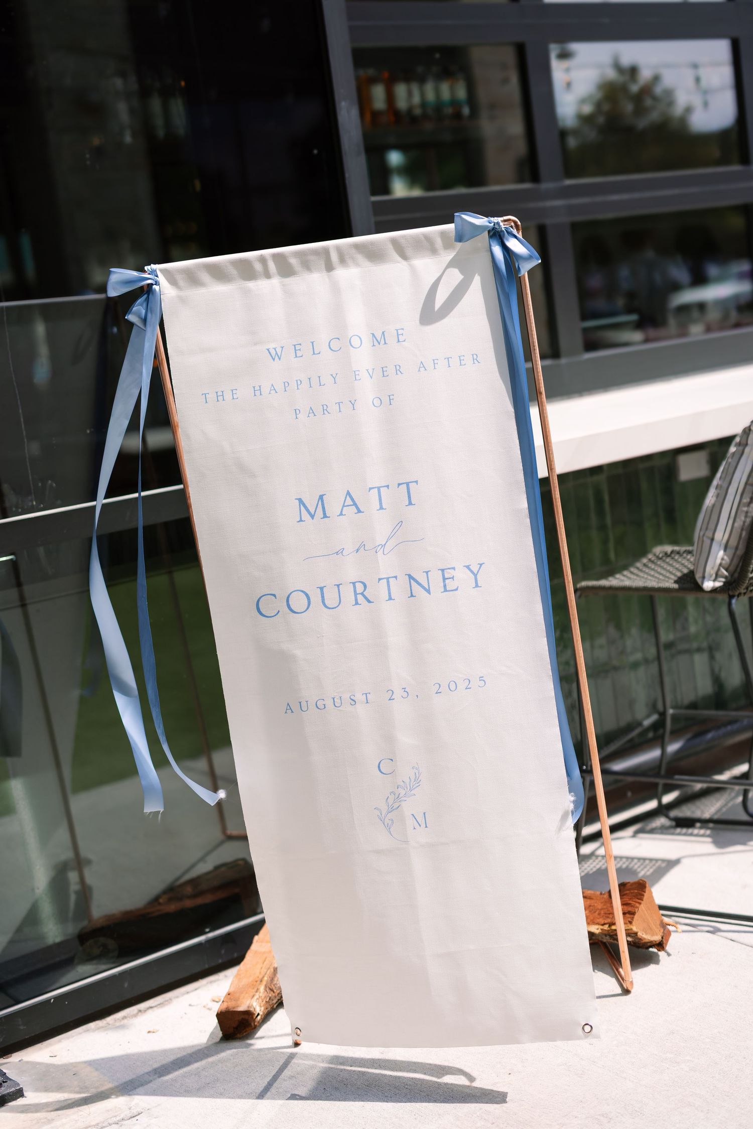 Elegant wedding welcome banner for Matt and Courtney's happily ever after party, August 25, 2023.