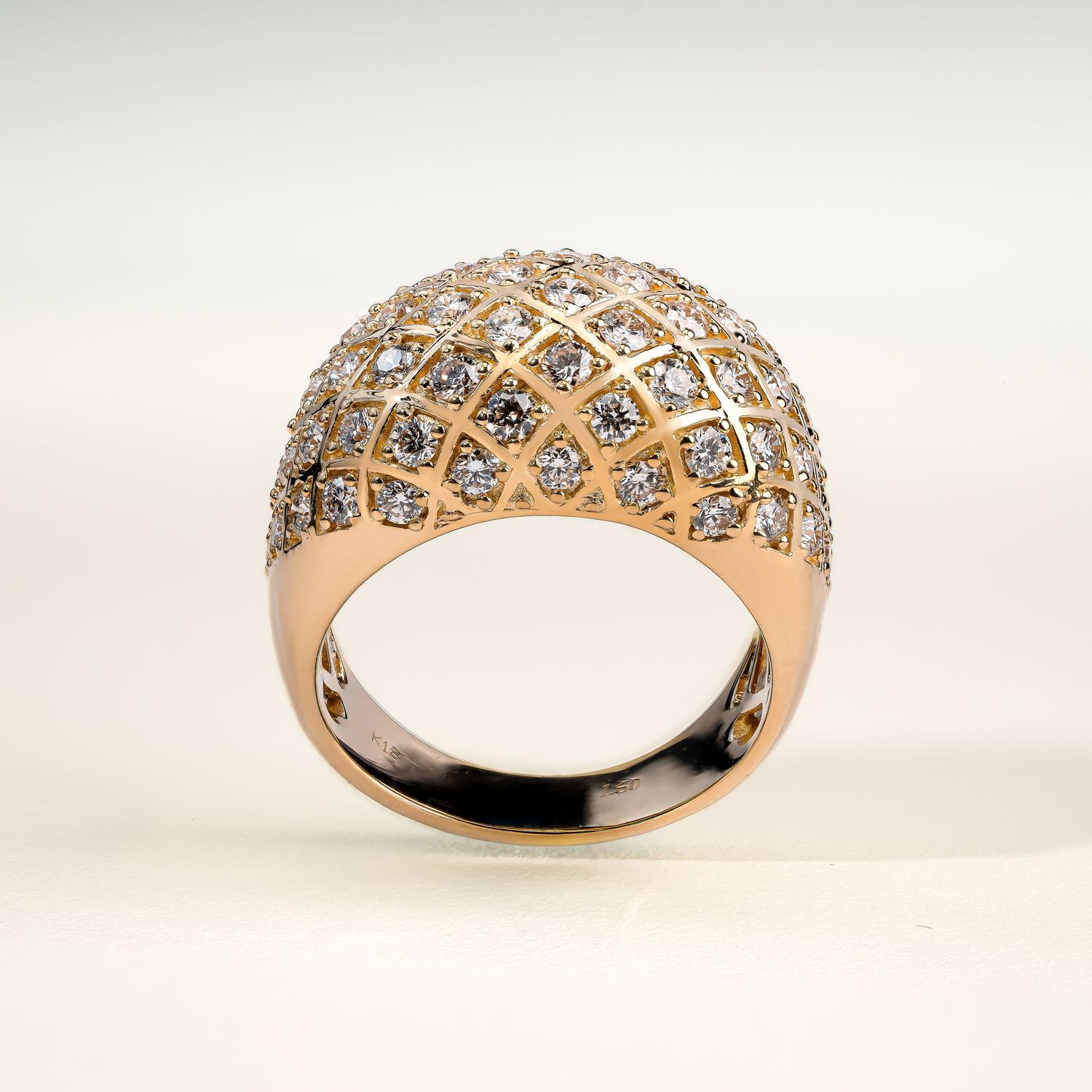 Rose gold diamond ring with intricate lattice pattern and pave set stones shown from multiple angles.