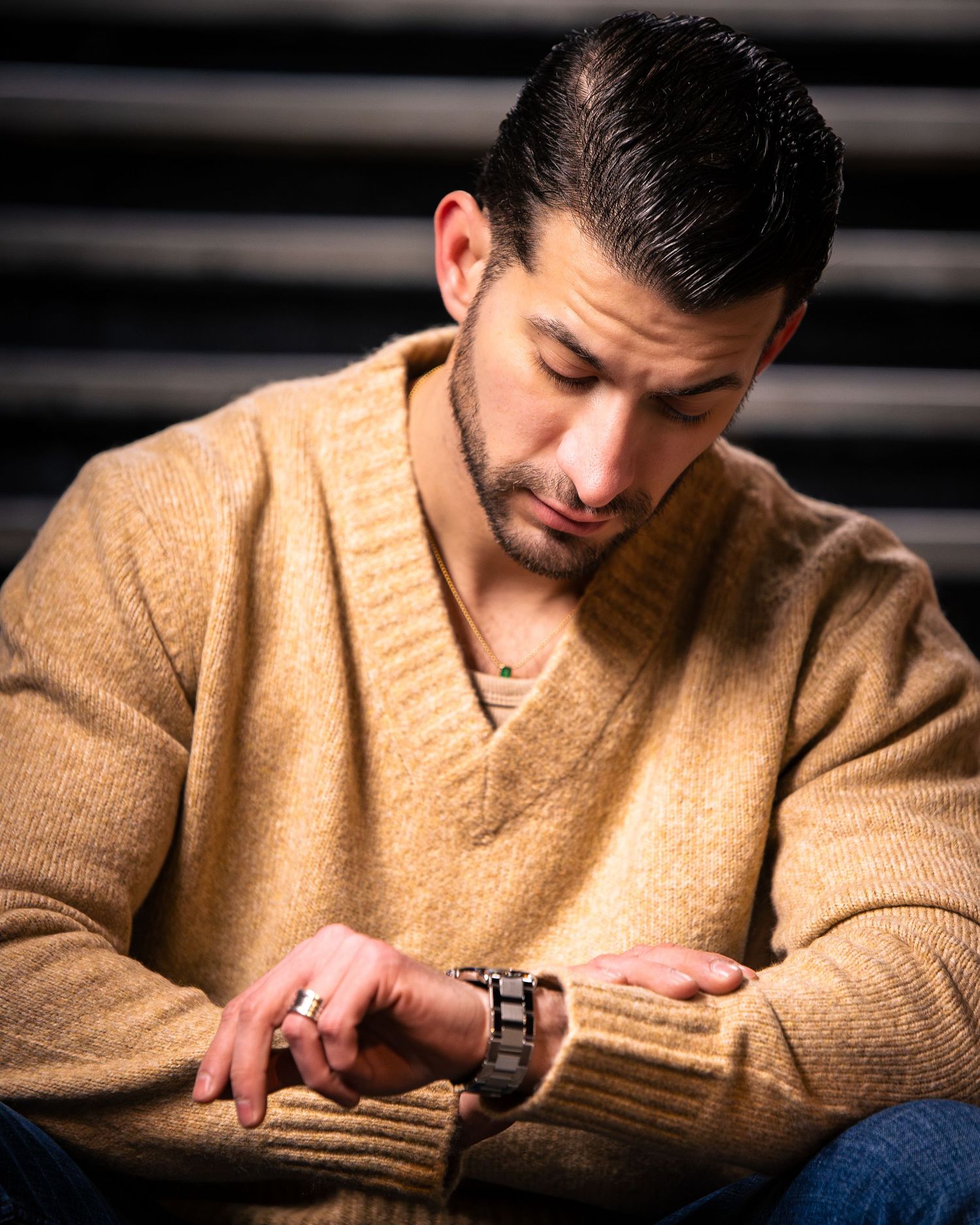 Portrait series showing man in tan sweater with contemplative expressions.