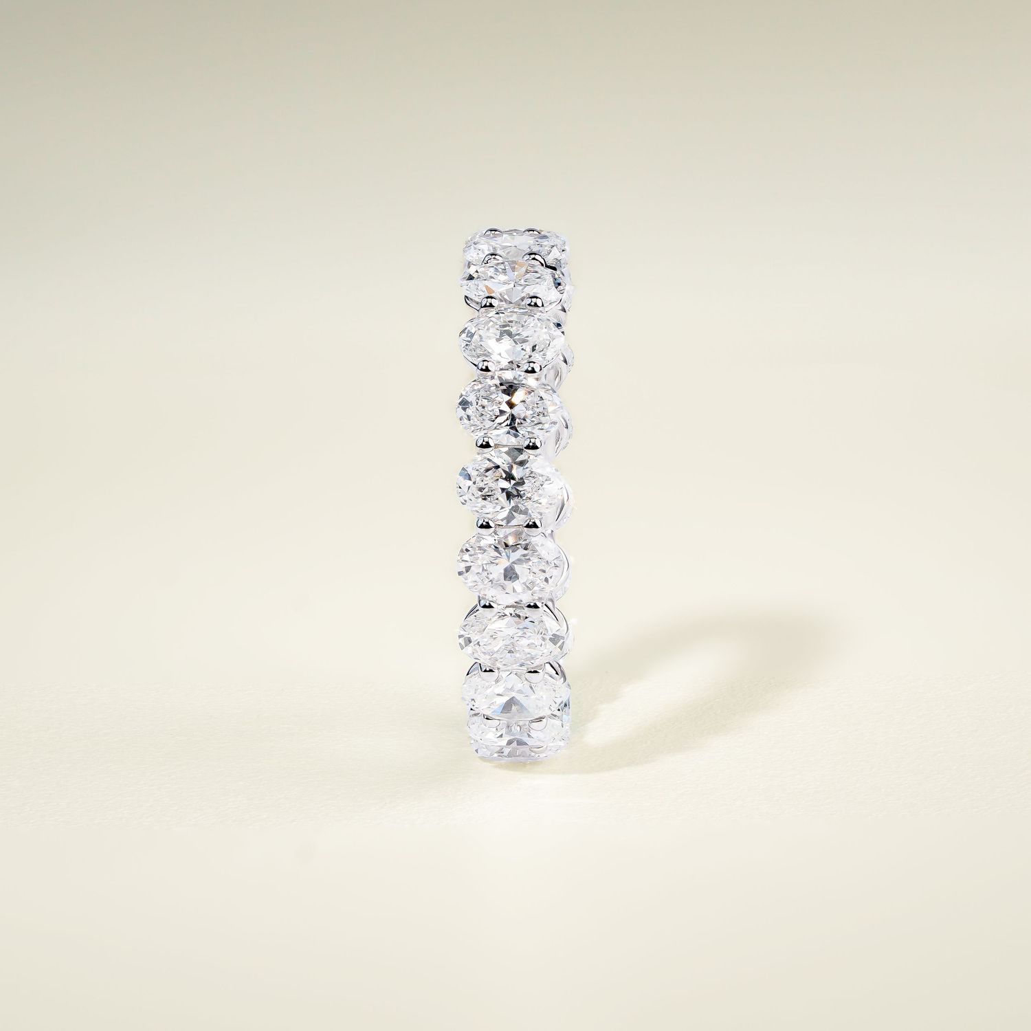 Classic white gold diamond pendant necklace shown in ascending views.