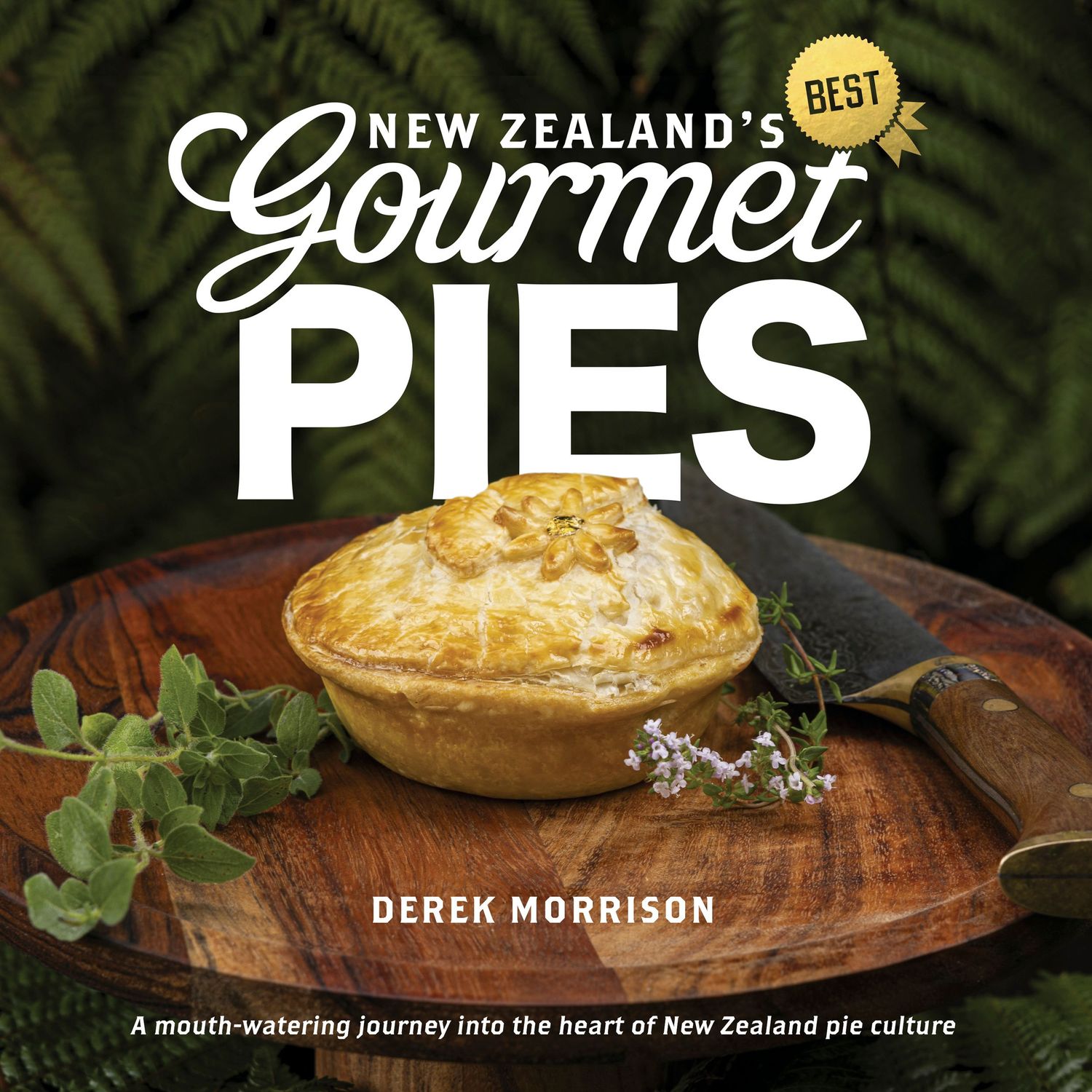 Culinary book covers featuring New Zealand pie recipes and culture arranged next to each other on dark background.