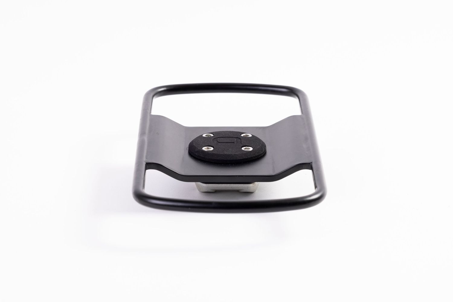 Minimalist black plastic device mount or holder photographed against white background.