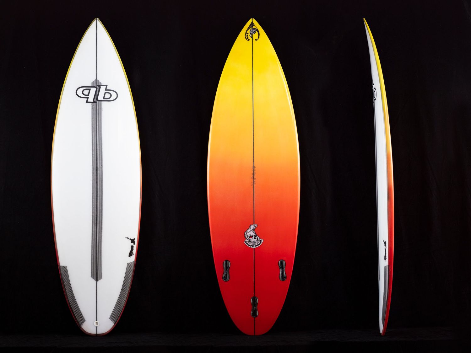 Three views of a white and orange surfboard design showing front, side and back angles.