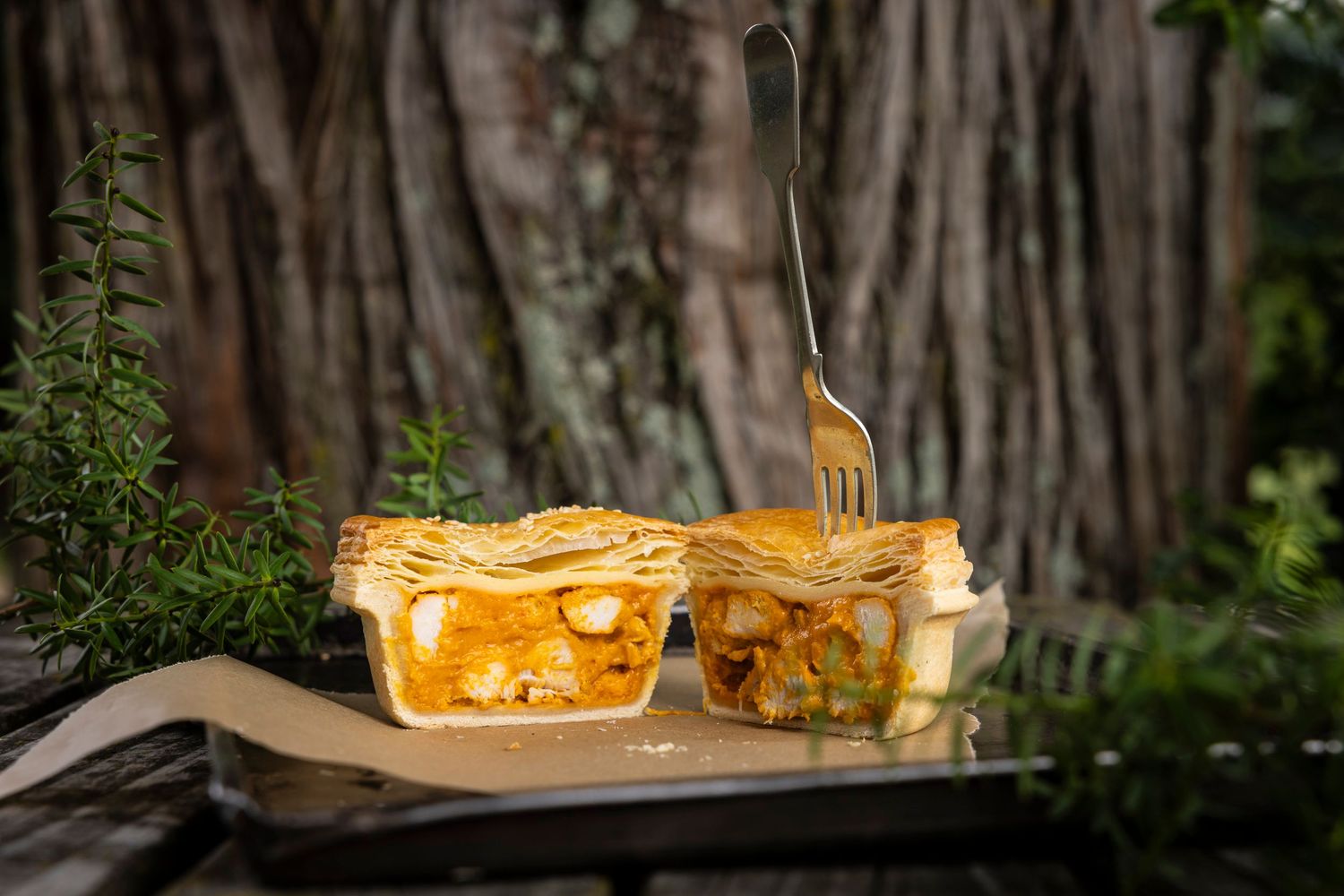Rustic wooden backdrop with ambient lighting creates a warm atmospheric setting for food photography.